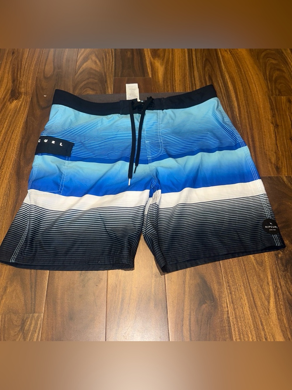 Rip Curl Men’s Blue Gradient Stripe Board Shorts